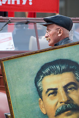 Image showing Member of KPRF bears Stalin's portrait