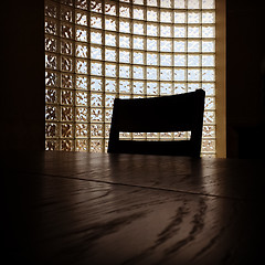 Image showing Dark interior with table and chair