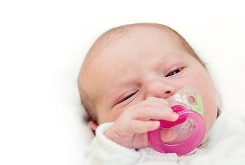 Image showing adorable baby with pacifier