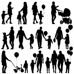 Image showing Black set of silhouettes of parents and children on white backgr