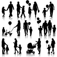 Image showing Black set of silhouettes of parents and children on white backgr