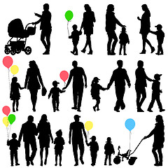 Image showing Black set of silhouettes of parents and children on white backgr