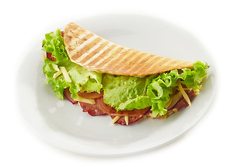 Image showing Tortilla with lettuce and smoked meat