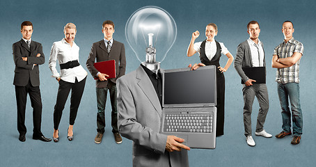 Image showing Business Team With Lamp Head