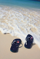 Image showing Aussie thongs on on the beach holiday