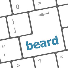 Image showing beard word on keyboard key, notebook computer button