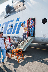 Image showing People exploring the MI-26T helicopter