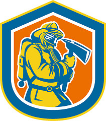Image showing Fireman Firefighter Holding Fire Axe Shield 