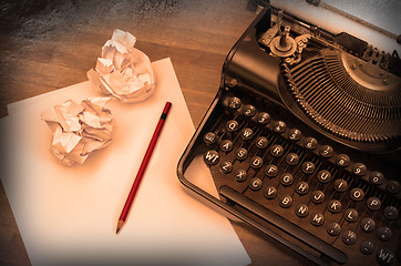 Image showing Close-up of an old typewriter with paper