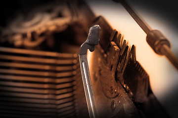 Image showing Close-up of an old retro typewriter with paper