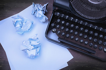 Image showing Close-up of an old typewriter with paper