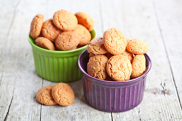 Image showing meringue almond cookies in bowls 