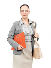 Image showing business woman with handbag and folder