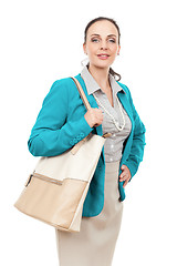 Image showing business woman with a beige handbag