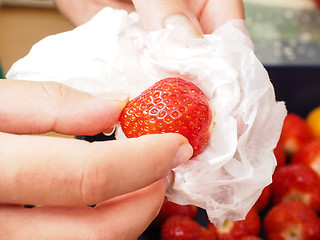 Image showing Washing strawberry