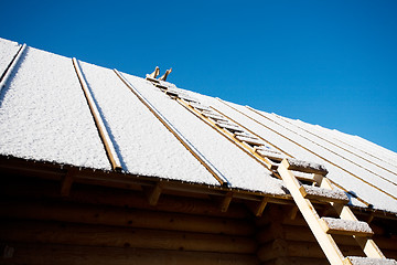 Image showing roof with staircase covered by snow