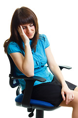 Image showing Beautiful young woman sitting on a chair snoozing. isolated on w