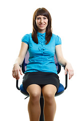 Image showing Beautiful young girl sitting on an office chair. isolated on whi