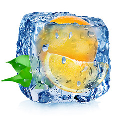 Image showing Orange in ice cube with drops