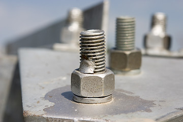 Image showing Metal construction with screws
