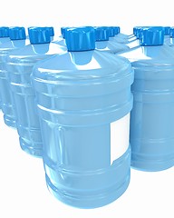 Image showing Bottles with clean blue water 