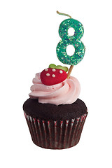 Image showing Mini cupcake with birthday candle for eight year old