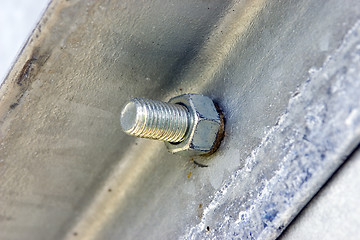 Image showing Metal construction with screws