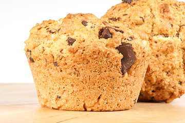 Image showing Two chocolate chips and pine nuts muffins