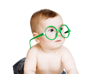 Image showing Little baby boy in the big funny glasses. isolated on white back