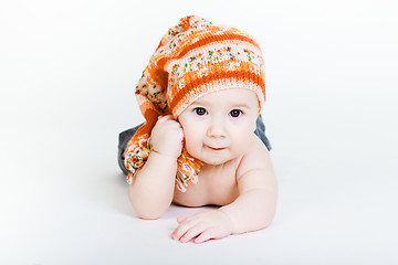 Image showing Little baby boy in a knitted hat posing