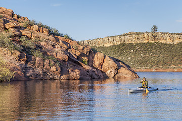 Image showing canoe paddling on a lake