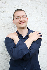 Image showing Man posing with arms crossed