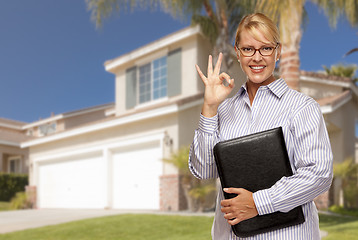 Image showing Attractive Businesswoman In Front of Nice Residential Home