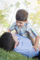 Image showing Father and Son Playing Together in the Park