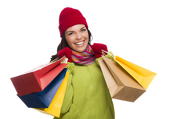 Image showing Mixed Race Woman Wearing Hat and Gloves Holding Shopping Bags