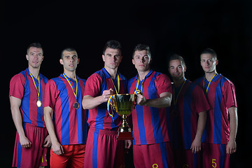 Image showing soccer players celebrating victory