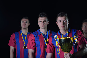 Image showing soccer players celebrating victory