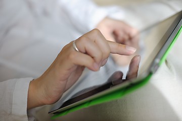 Image showing woman using tablet pc at home