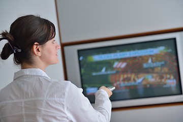 Image showing happy young woman relax at home on sofa