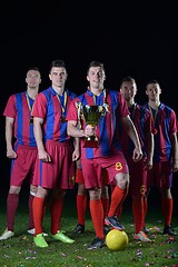 Image showing soccer players celebrating victory