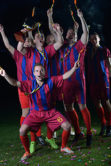 Image showing soccer players celebrating victory