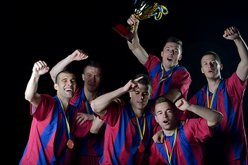 Image showing soccer players celebrating victory