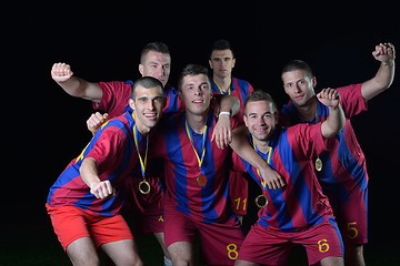 Image showing soccer players celebrating victory