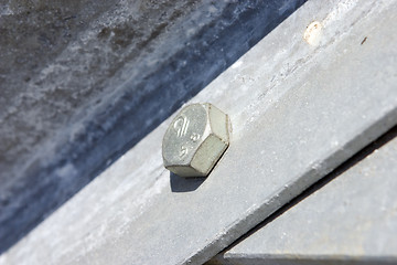 Image showing Metal construction with screws