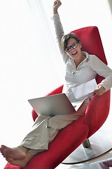 Image showing woman using a laptop computer at home