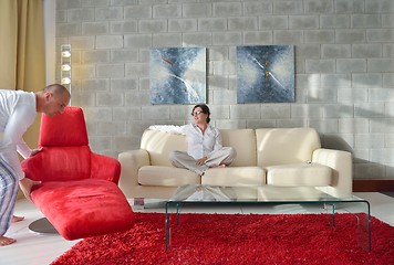 Image showing happy young woman relax at home on sofa