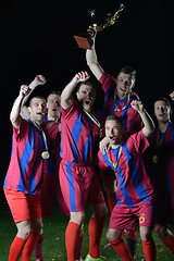 Image showing soccer players celebrating victory