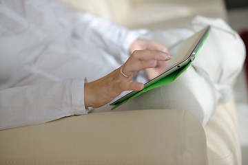 Image showing woman using tablet pc at home