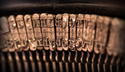 Image showing Close-up of an old retro typewriter with paper