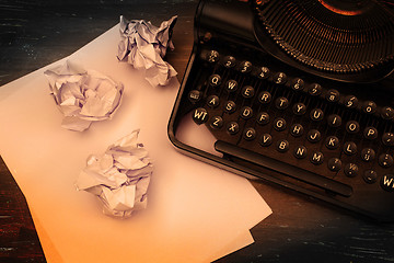 Image showing Close-up of an old typewriter with paper